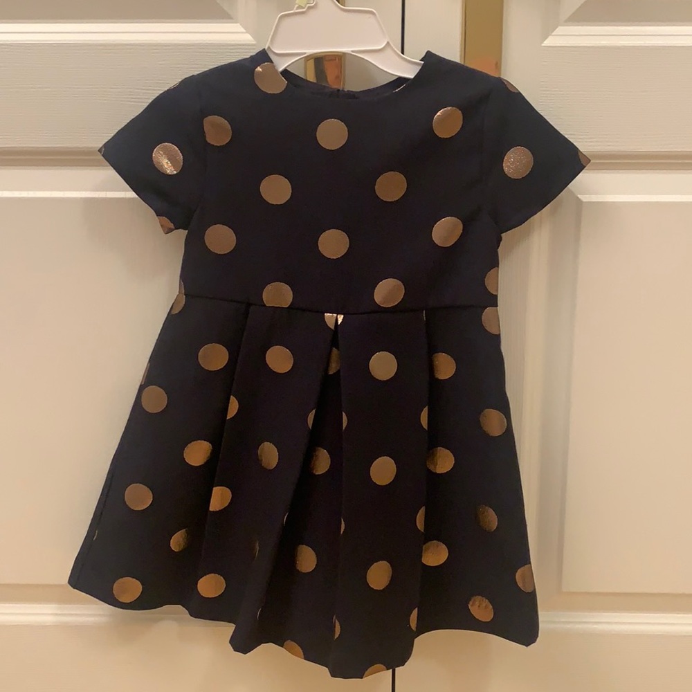 Never worn. With tags.Jacadi sleeveless dress navy with gold polka dots.…size 8.